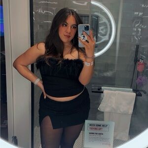 Black feather trimmed top